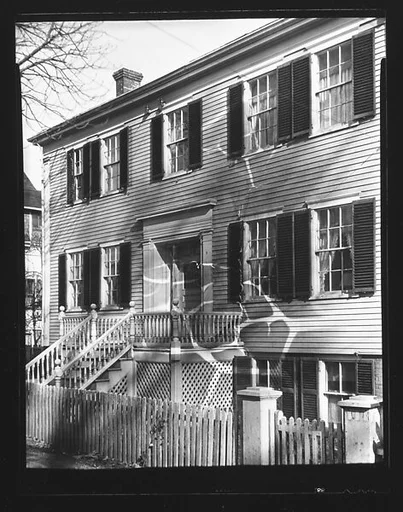 [Clapboard House with Raised, Trellised Entry Porch]