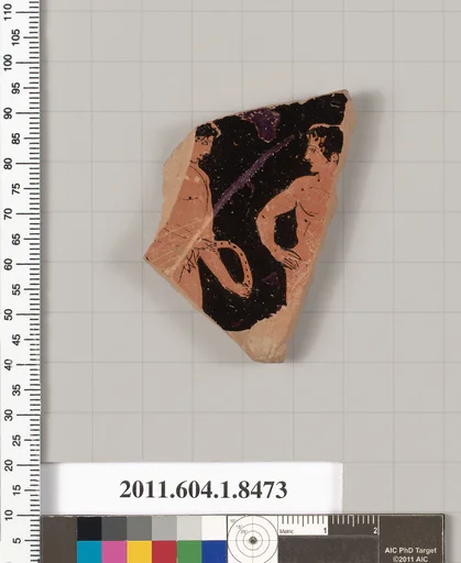 Terracotta fragment of a stemless kylix (drinking cup)