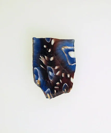 Glass mosaic ribbed bowl fragment