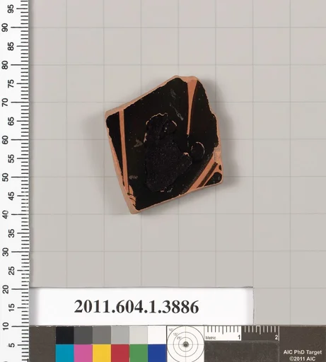 Terracotta fragment of a kylix (drinking cup)