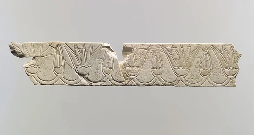 Incised furniture plaque with a frieze of lotus blossoms and buds