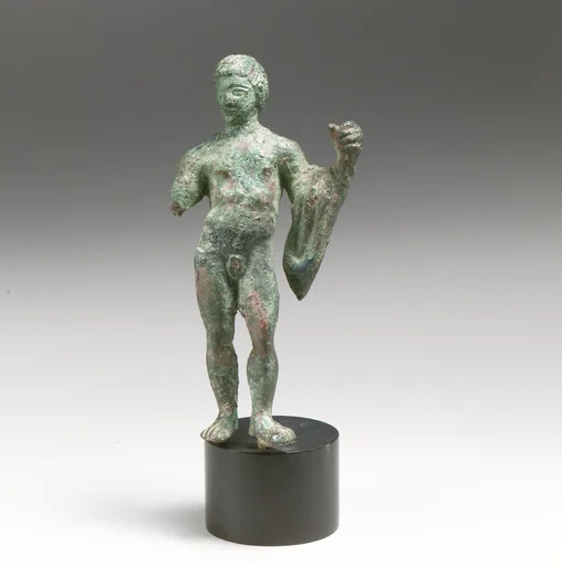 Bronze statuette of a youth with a chlamys