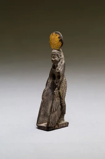 Goddess with gilded sundisk and wings