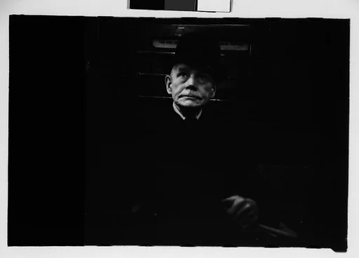 [Five 35mm Film Frames: Subway Passengers, New York City: Man in Bowler Hat]