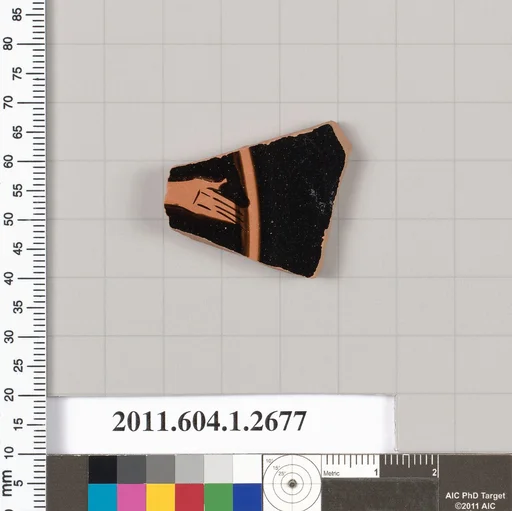 Terracotta fragment of a kylix (drinking cup)