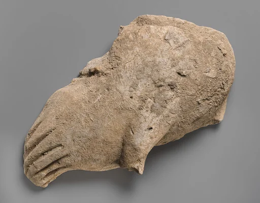 Fragment of a wall decoration with part of a bird