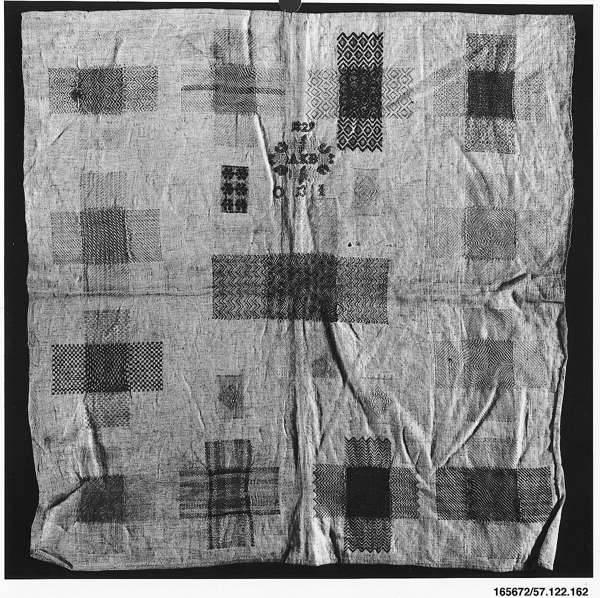 Embroidered darning sampler — Unknown