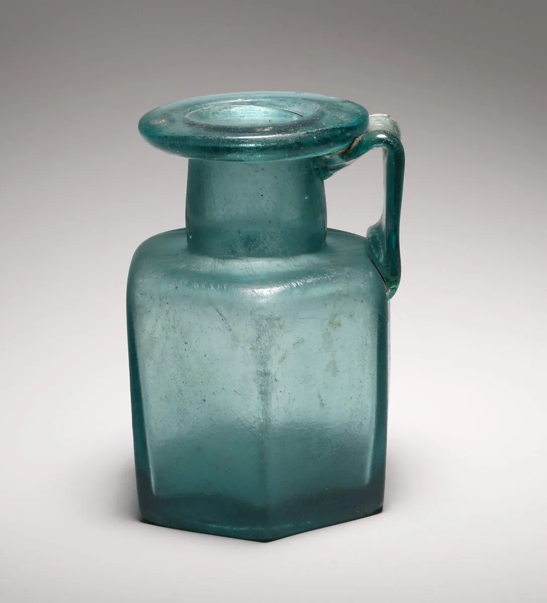 Glass hexagonal bottle — Unknown