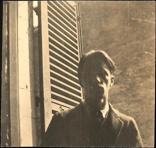 [Self-Portrait in Window, 5 rue de la Santè, Paris]