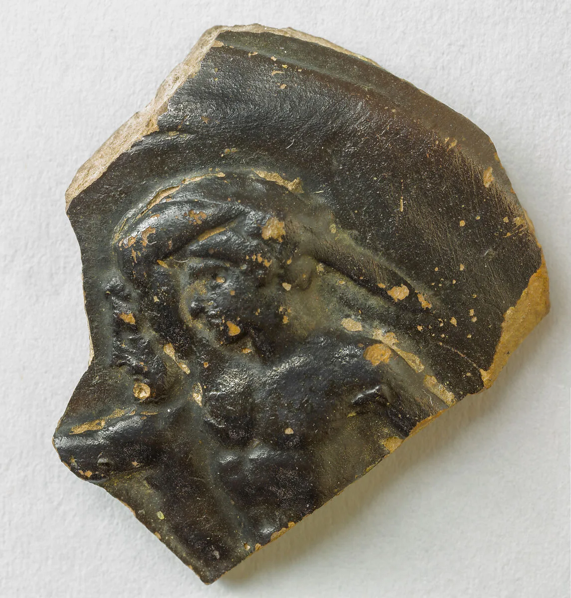 Fragment of a terracotta guttus (oil flask) — Unknown