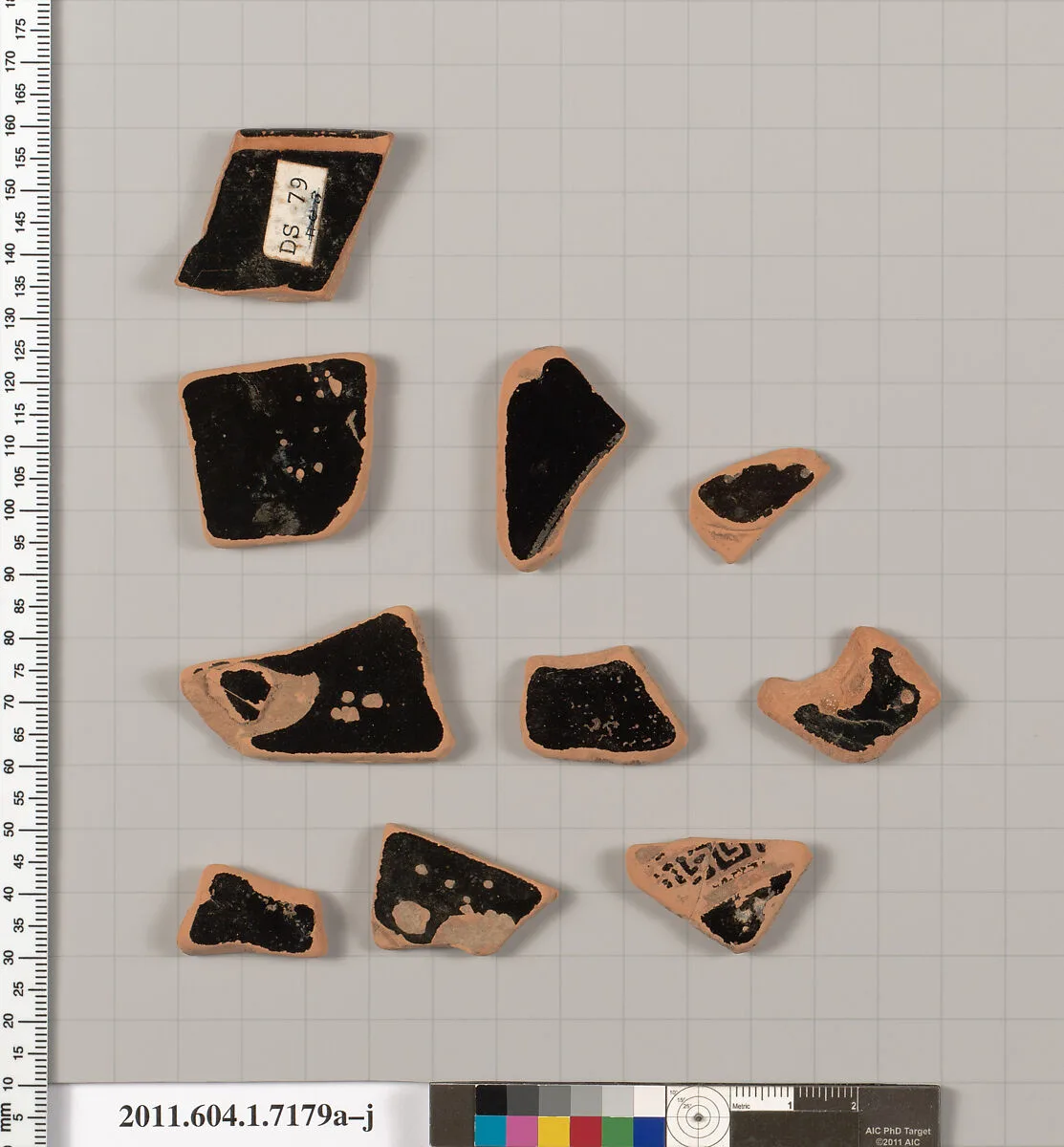 Terracotta fragments of a kylix (drinking cup) — Makron