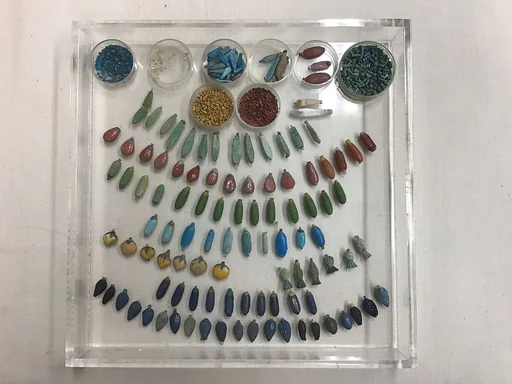 Collar pendants and beads
