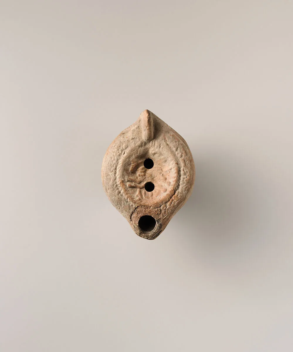Terracotta oil lamp — Unknown