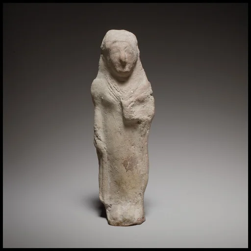 Standing female figurine holding a flower