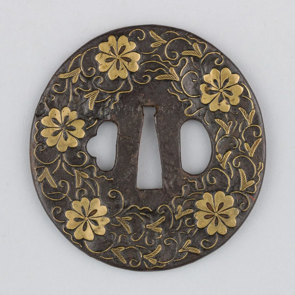 Sword guard (<i>Tsuba</i>) With Cherry Blossom Motif (桜図与四郎象嵌鐔) — Unknown