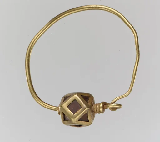 Gold Earring with Garnets
