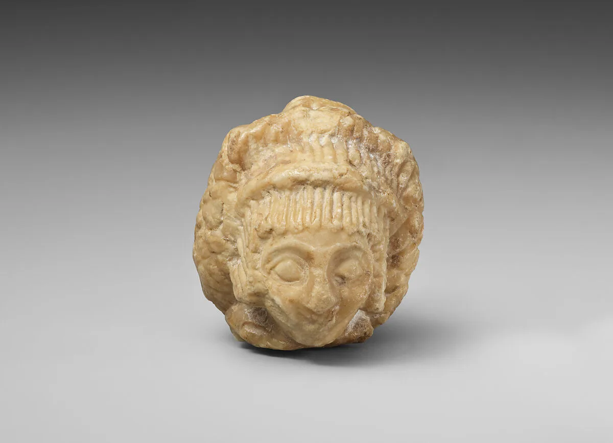 Female head — Unknown