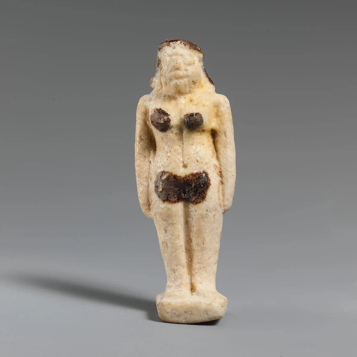 Faience statuette of a woman — Unknown