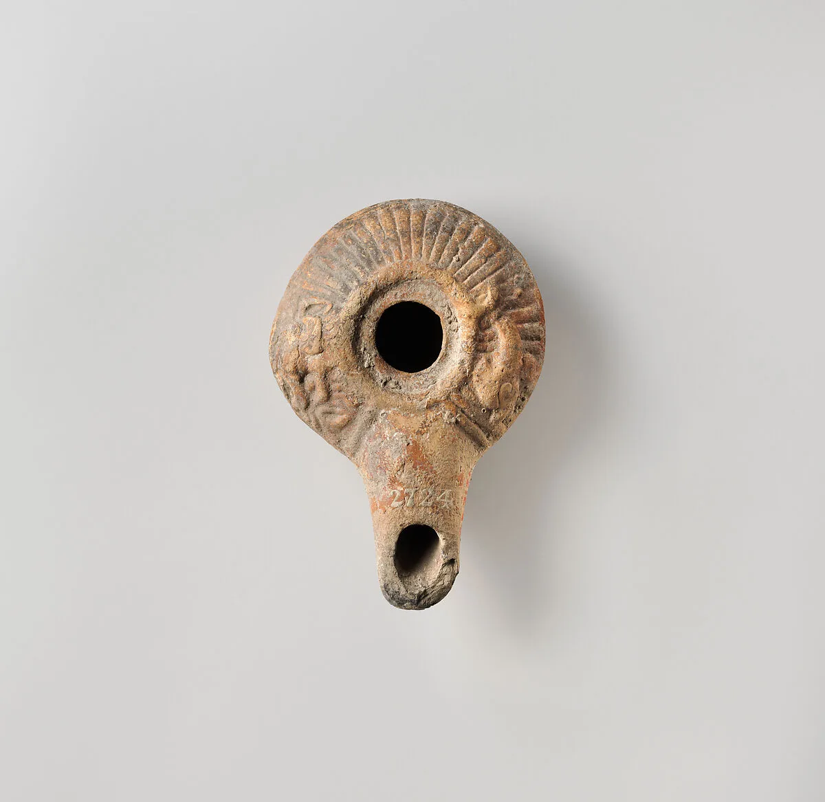 Terracotta oil lamp — Unknown