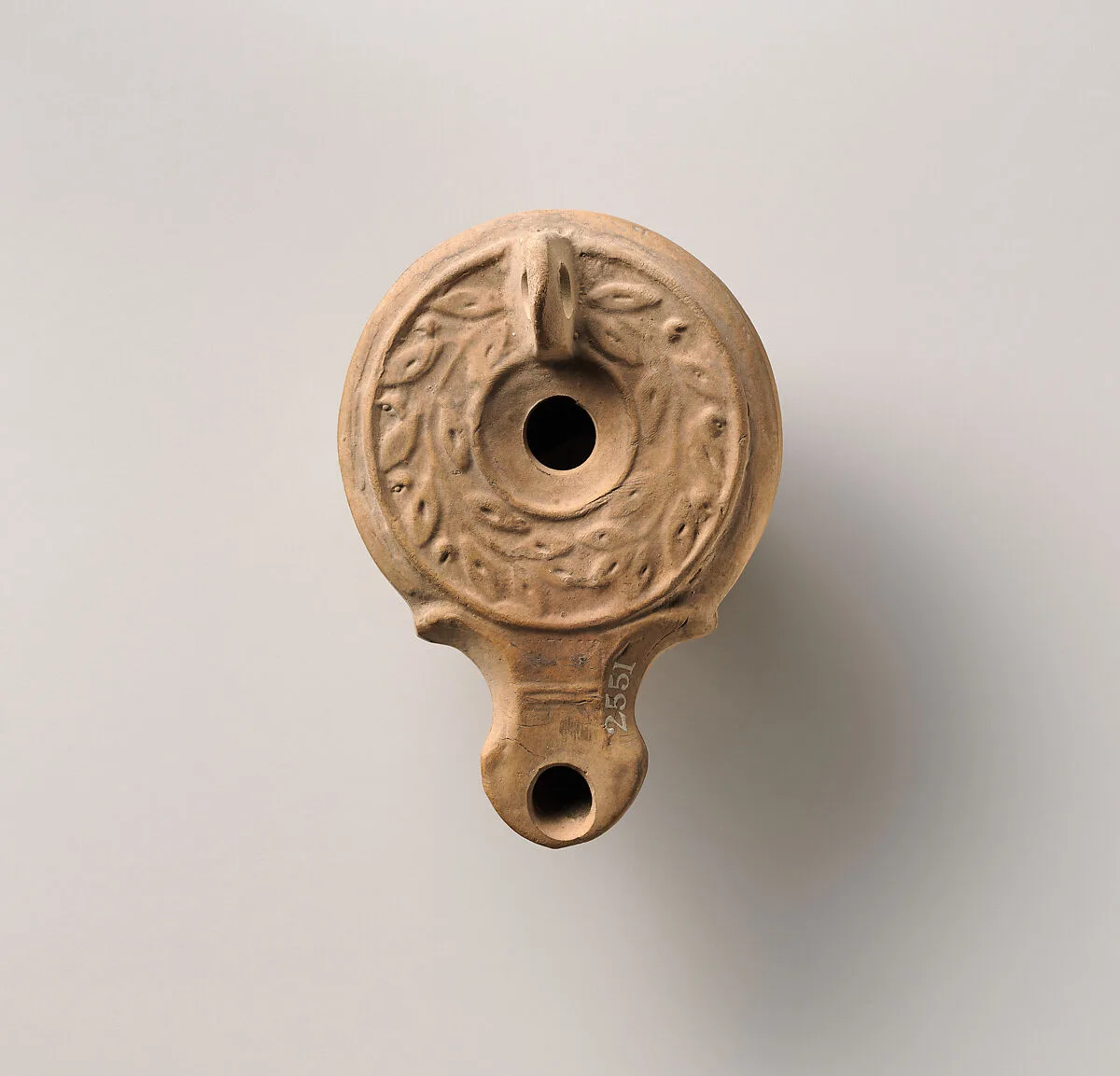 Terracotta oil lamp — Unknown