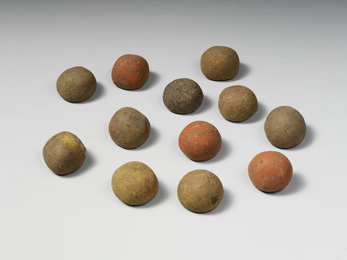 Set of twelve red terracotta balls — Unknown