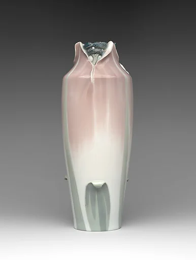 Vase with flowering plant