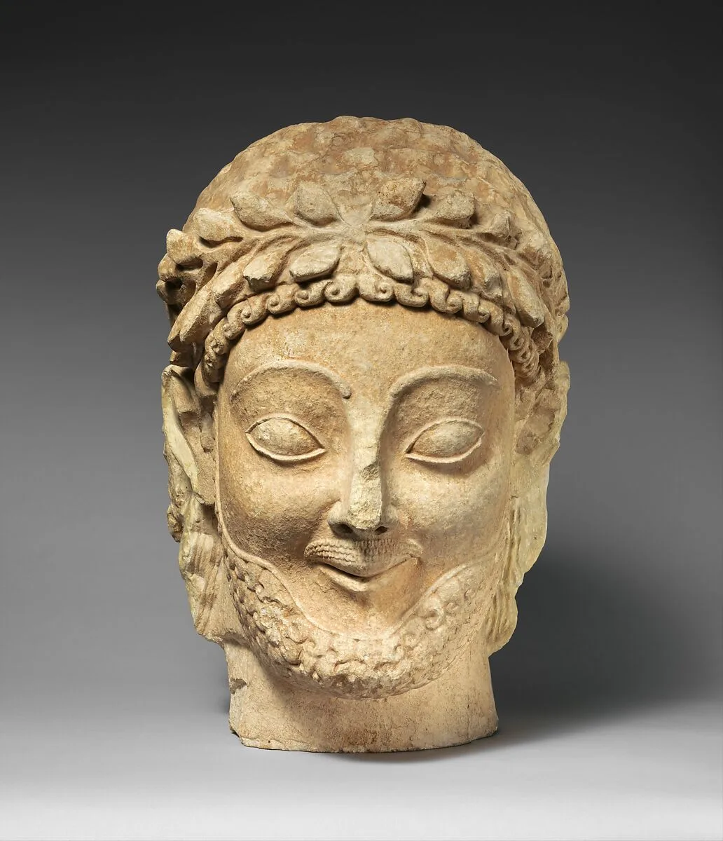 Limestone male head — Unknown