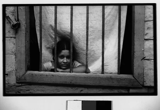 [Girl Behind Barred Window, Havana]