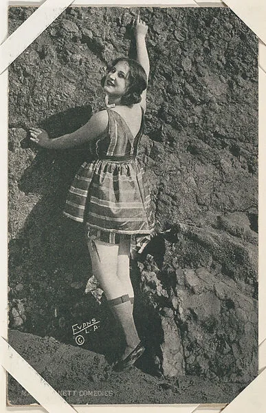 Bathing beauty against rock wall from Mack Sennett Comedies Arcade series (W423) — Unknown