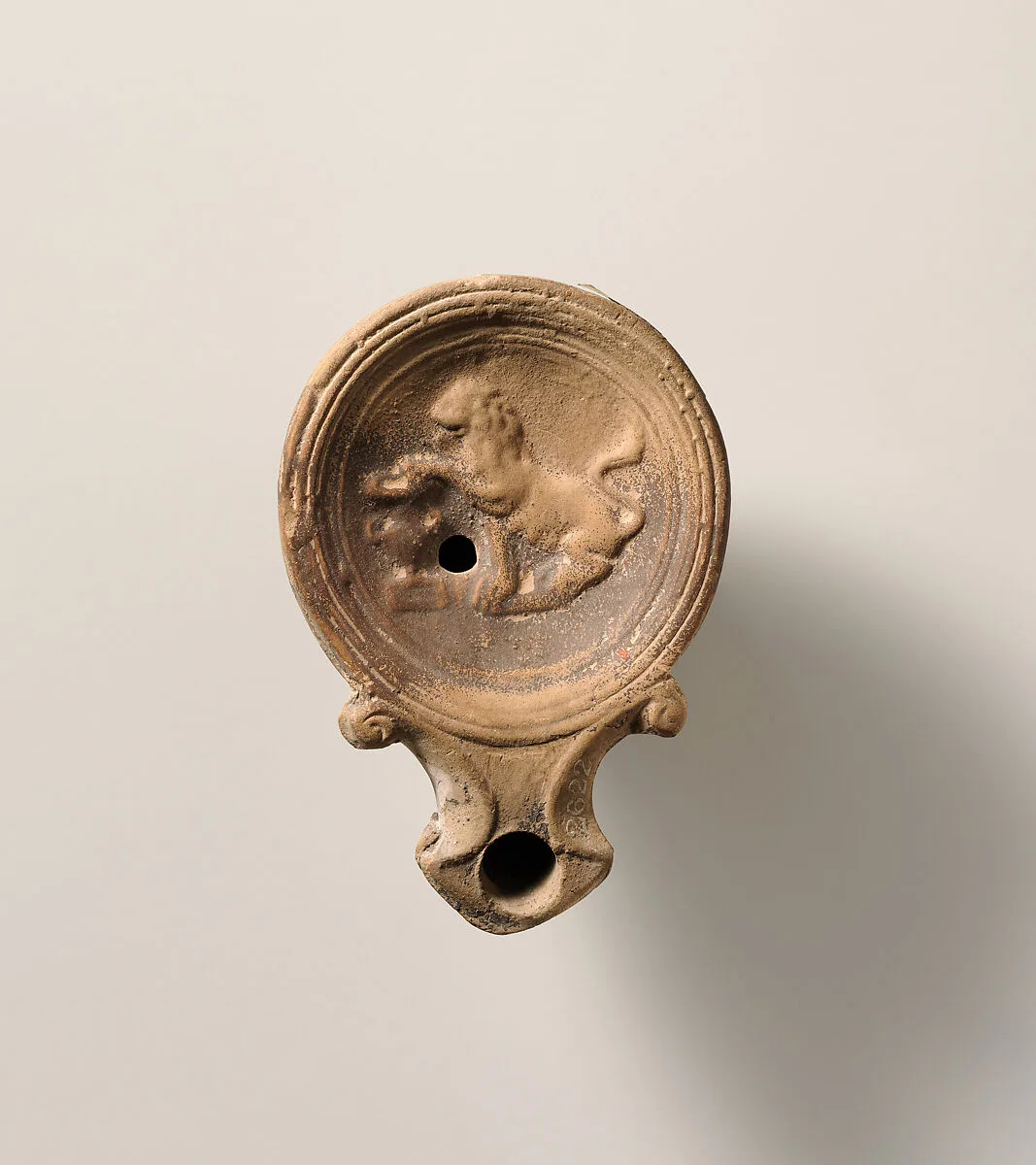 Terracotta oil lamp — Unknown