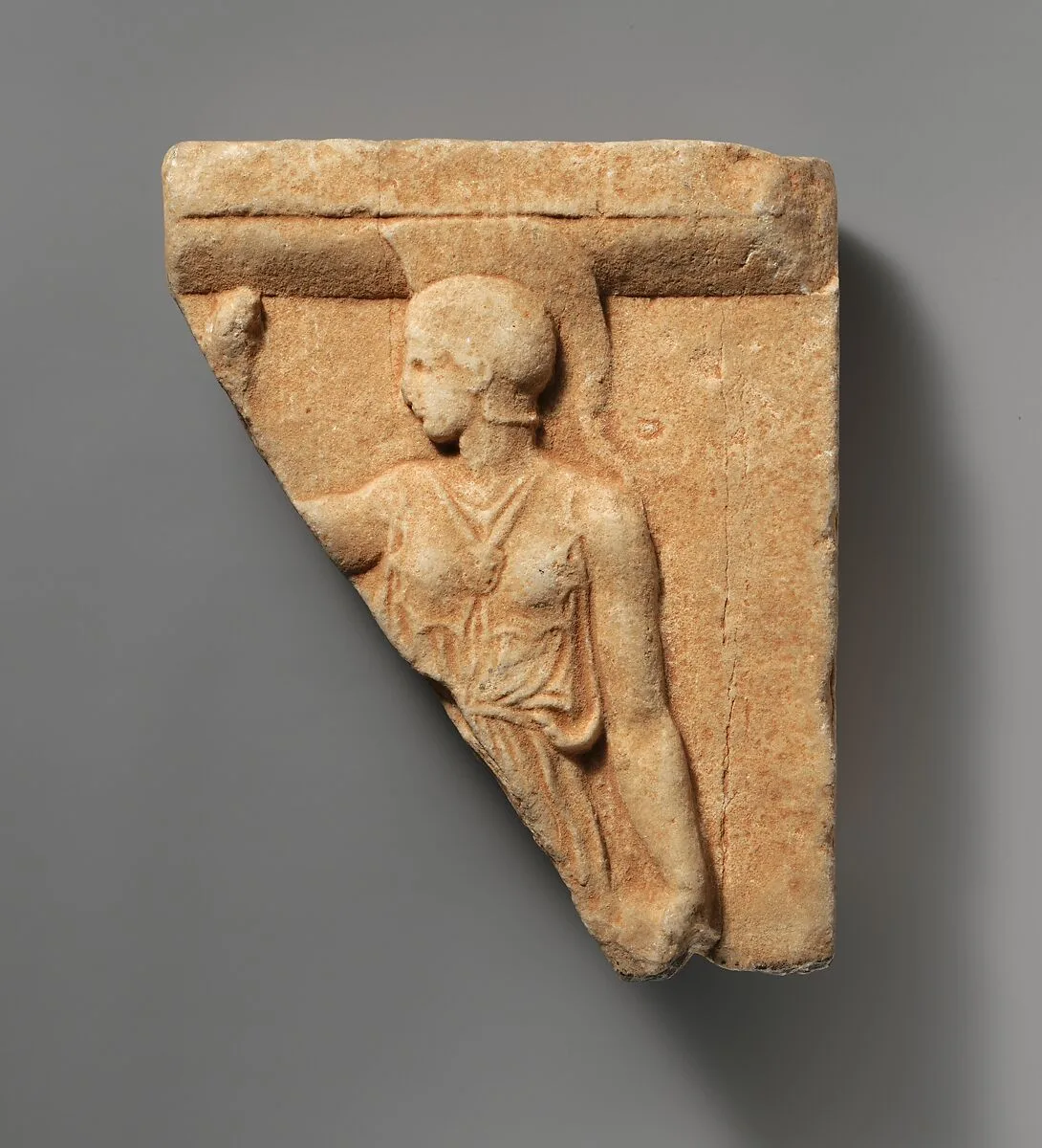 Marble fragment of a votive relief with Athena — Unknown