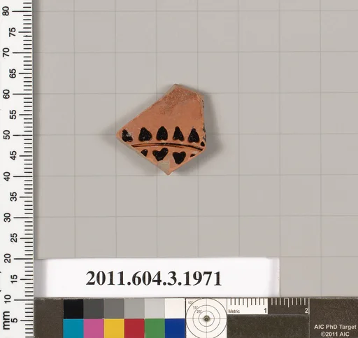 Terracotta fragment of a kylix (drinking cup)