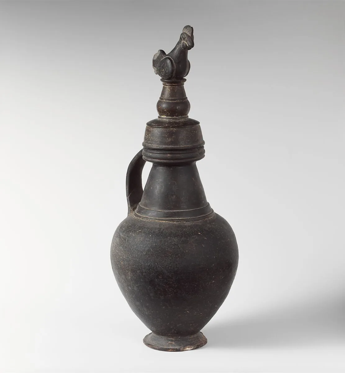 Terracotta jug with lid — Unknown