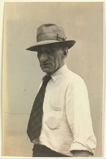 [Male Pedestrian in White Shirt with Tartan Tie, Detroit (for Fortune Magazine Article "Labor Anonymous")]