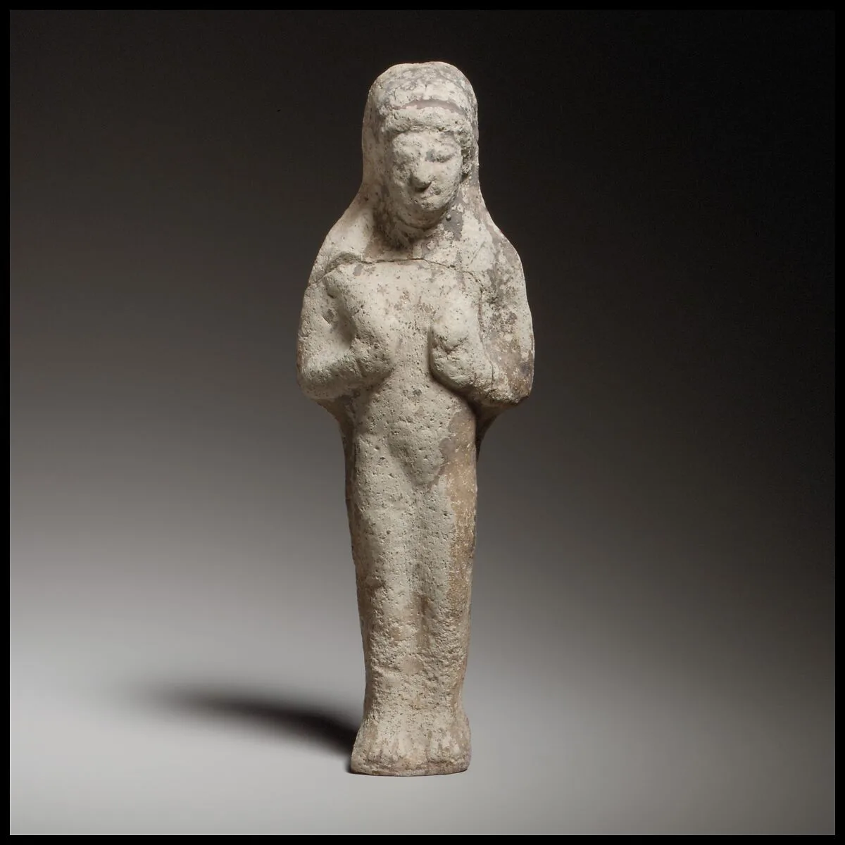 Standing female figurine — Unknown