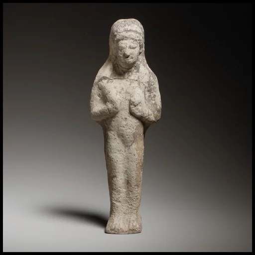 Standing female figurine