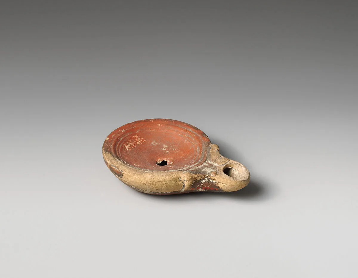 Tarracotta oil lamp — Unknown