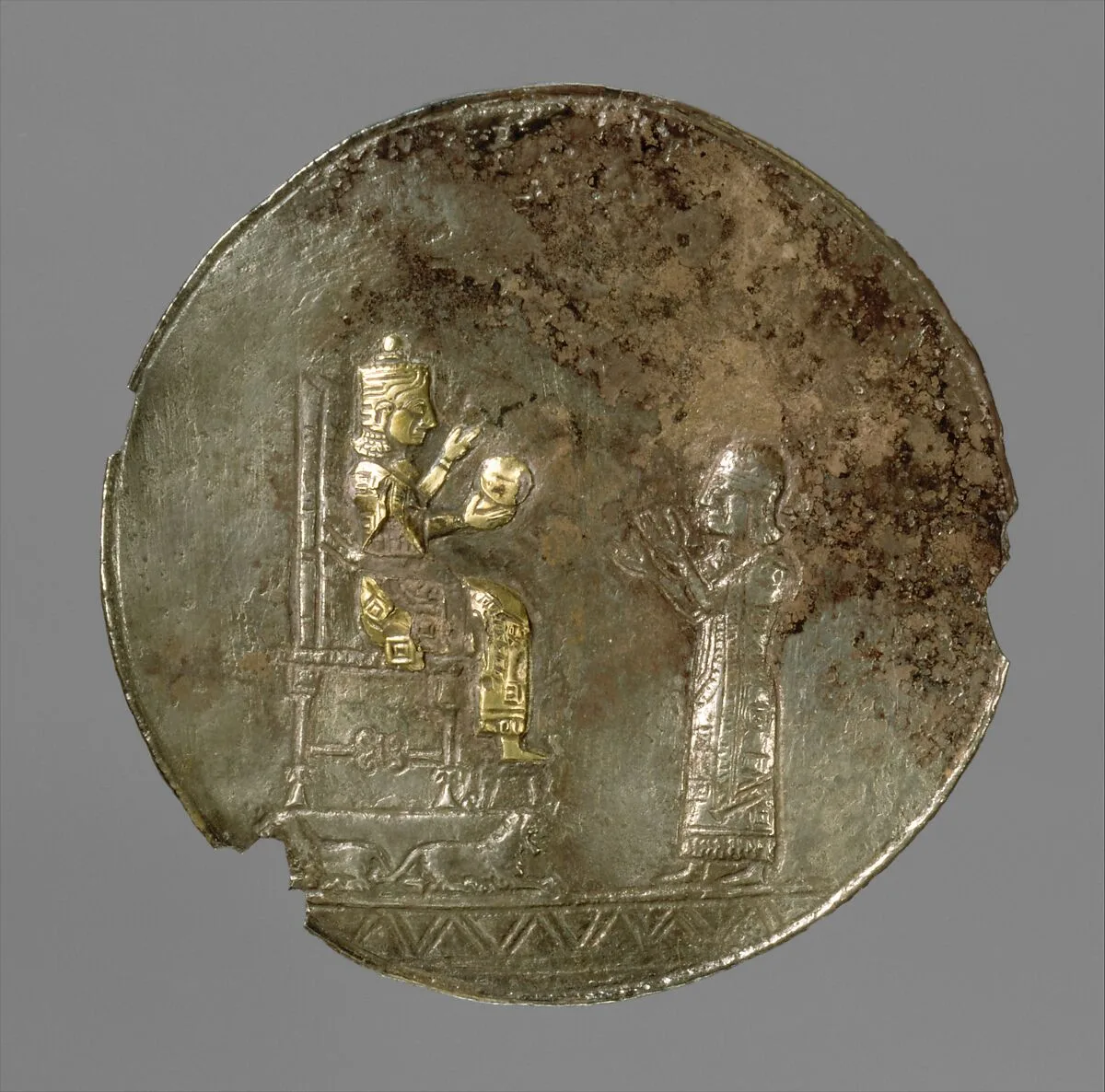 Medallion with a seated deity and a male worshiper — Unknown