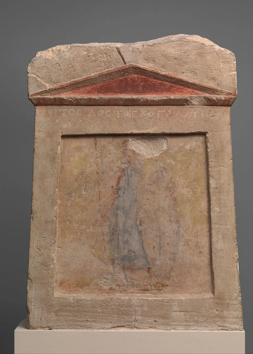 Painted limestone funerary slab with a soldier standing at ease — Unknown