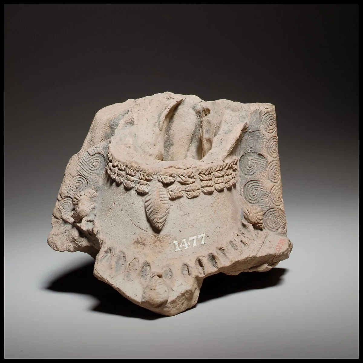 Fragment of a terracotta female figure — Unknown