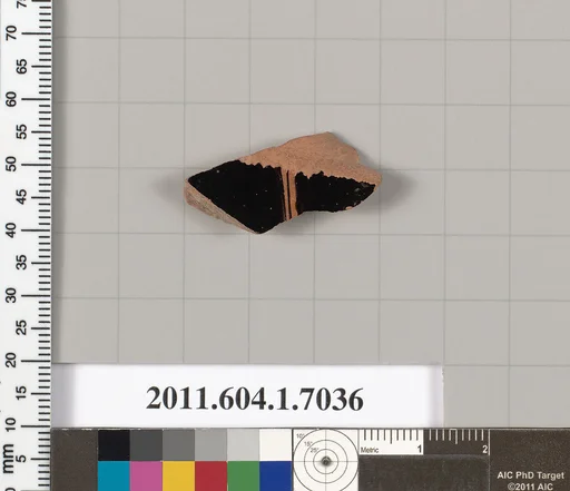 Terracotta fragment of a kylix (drinking cup)