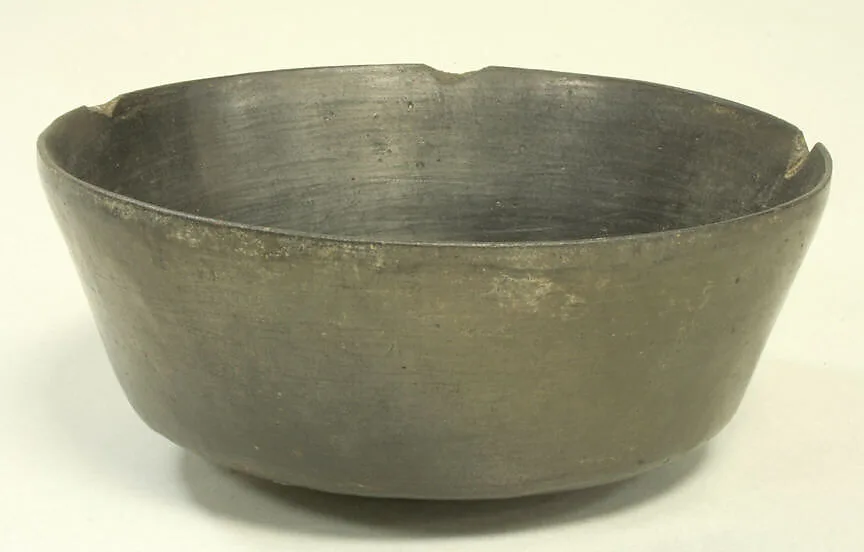 Blackware Bowl with Fish and Scroll Motif — Unknown