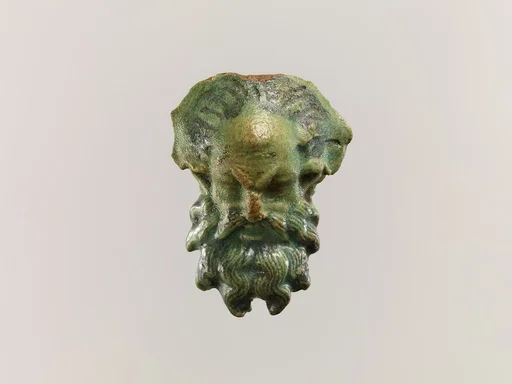 Head of a satyr for attachment to a jug