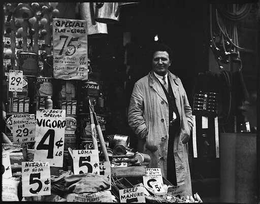 [Man Outside Dry Goods Store]