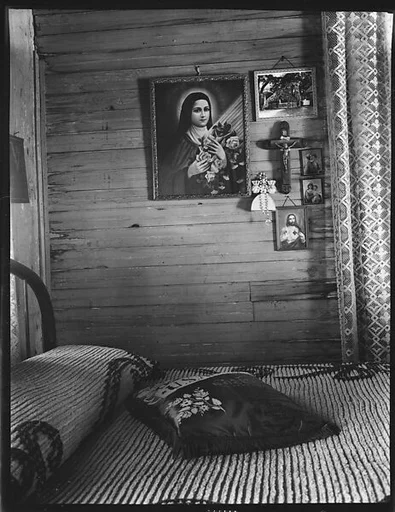 [Bedroom Interior with Religious Pictures on Wall, Shrimp Fisherman's House, Biloxi, Mississippi]