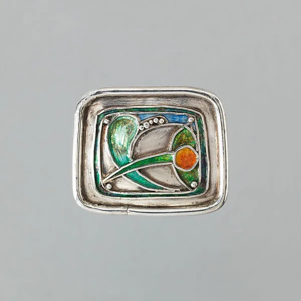 Rectangle brooch with stylized flower (?) in green, orange, blue enamel — Frances McNair