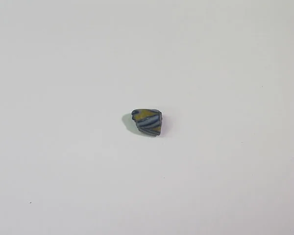 Blue, yellow, and white bead with trailed decoration — Unknown