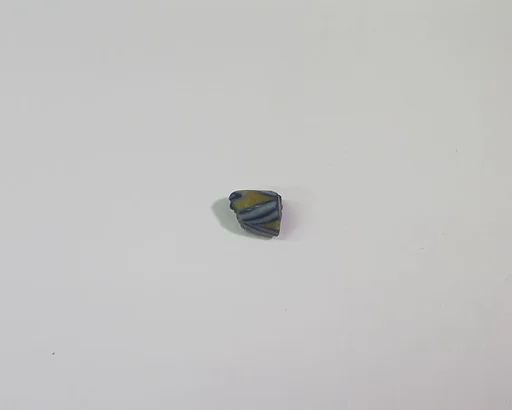 Blue, yellow, and white bead with trailed decoration