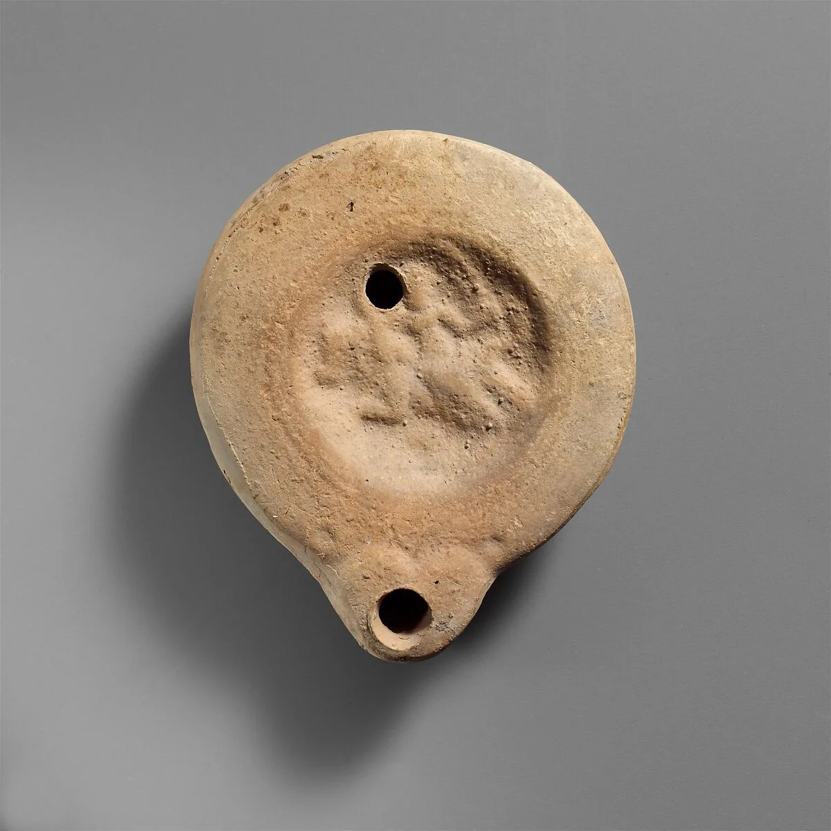 Terracotta oil lamp — Unknown