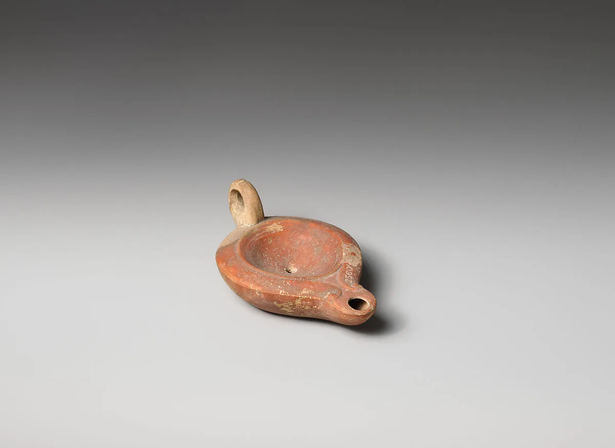 Terracotta oil lamp — Unknown